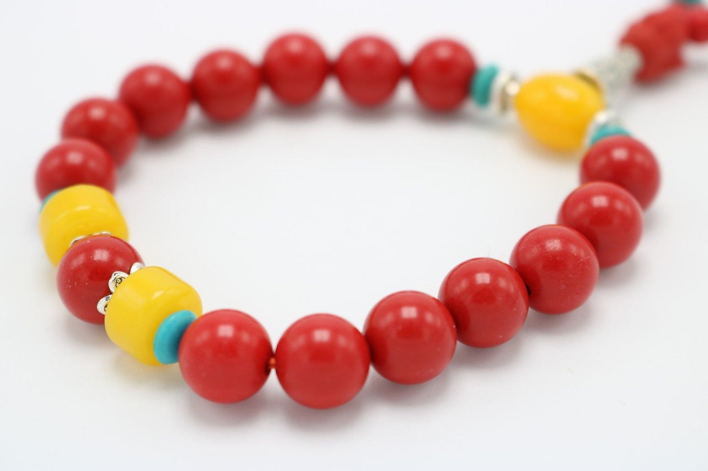 Beautiful Red Colored Wooden Bracelet Buddha Head with Yellow Stones
